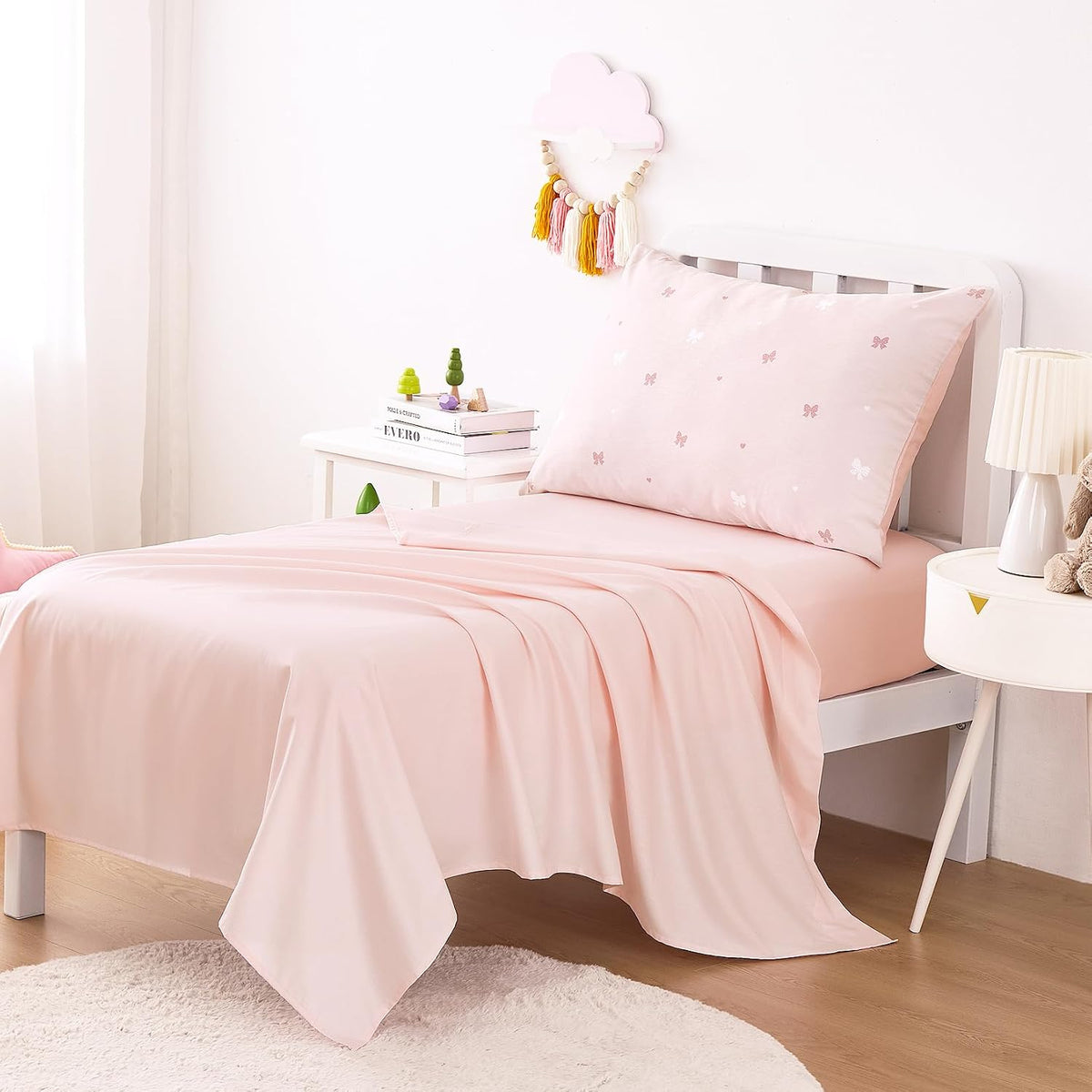Wake In Cloud - Toddler Bedding Set for Girls, 100% Cotton Fabric, Cute Bow Heart Romantic Princess Style, 4 Pieces Soft Crib Bed Set Including Comforter, Sheets and Pillowcase, Pastel Pink